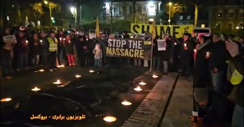 تجمع و افروختن شمع در مقابل سفارت رژیم در بروکسل به دعوت سازمان عفو بین الملل
